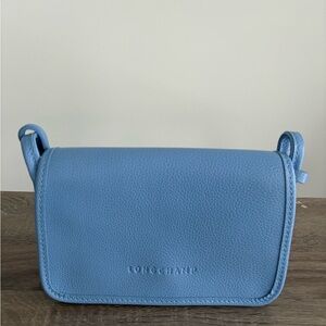 Longchamp like new LE FOULONNÉ XS CLUTCH light blue see all photos